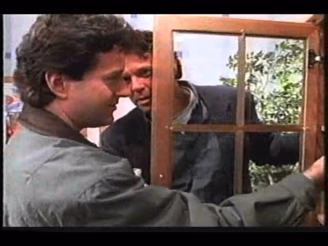 IKEA ad depicting two men choosing a couch