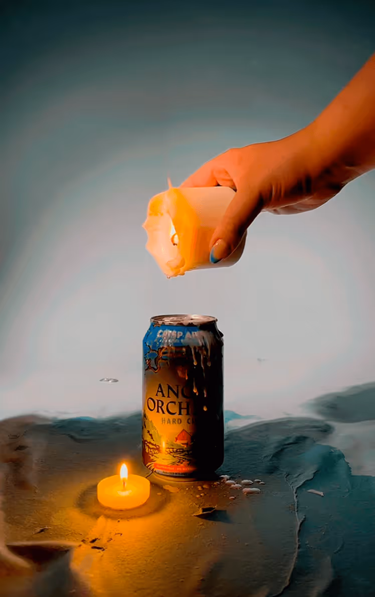 Dripping candle wax on Angry Orchard