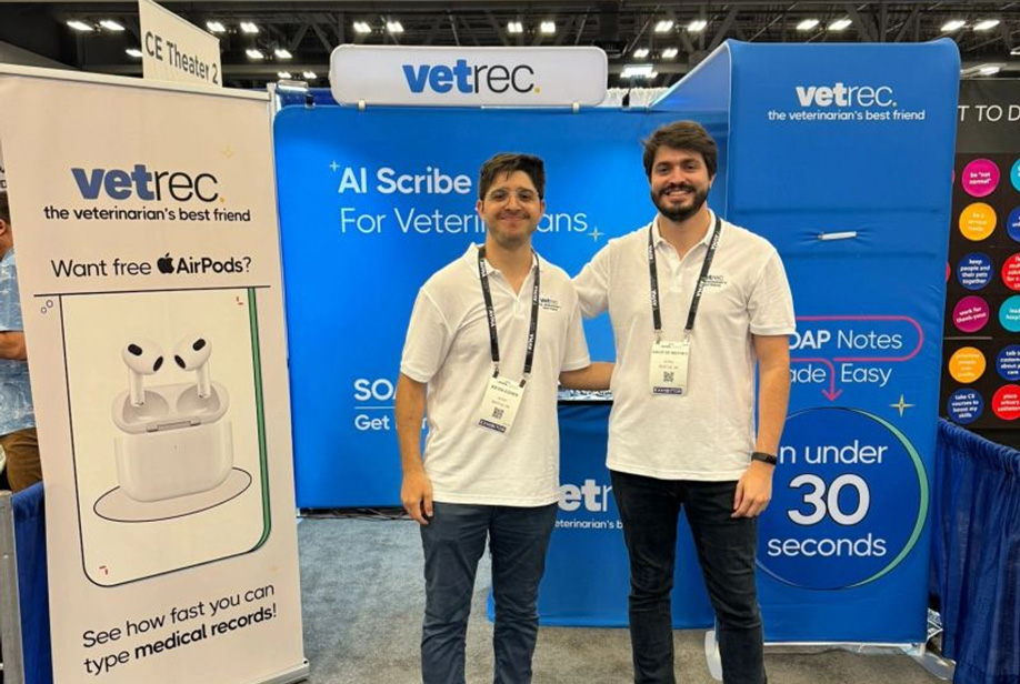 David and Kevin in front of booth at AVMA