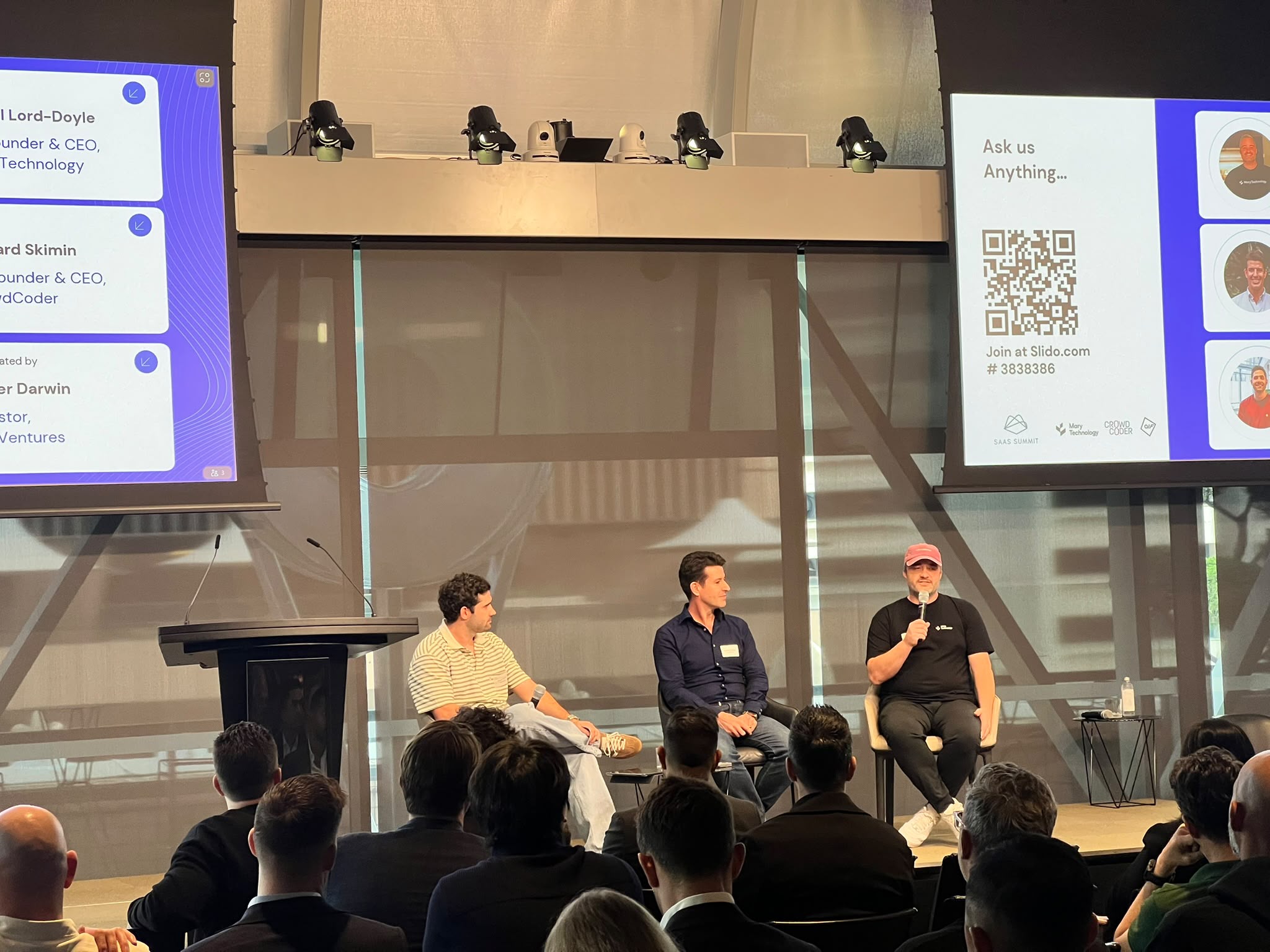 Panelists talking on stage