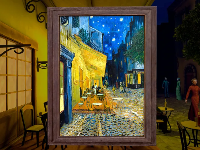 Framed reproduction of Van Gogh's 'Café Terrace at Night' showing a brightly lit yellow café terrace with tables and chairs under a starry blue night sky.