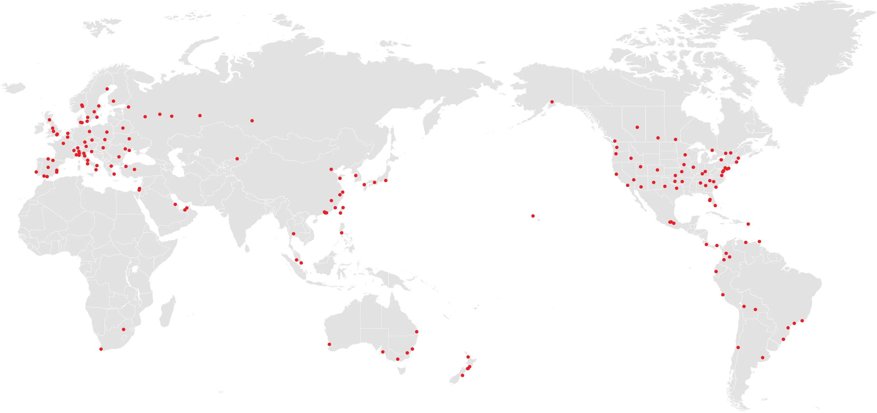 World map with multiple red dots indicating various global locations concentrated in North America, Europe, and Asia.