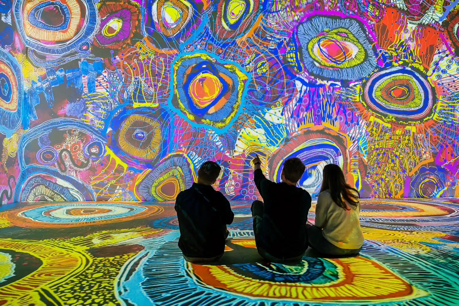 Three visitors experience Connection