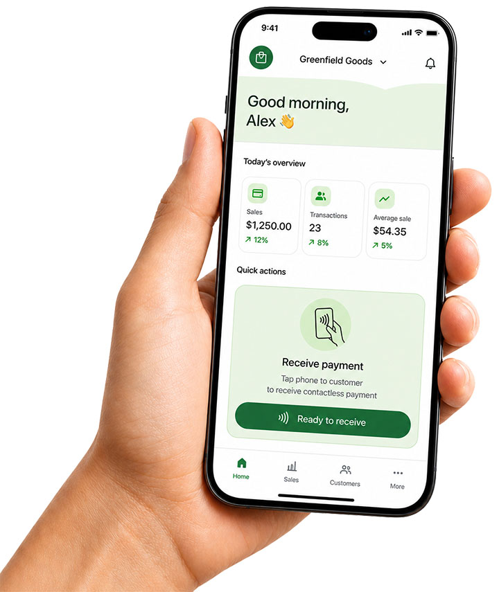 Hand holding phone displaying sales app with overview and contactless payment ready to receive.