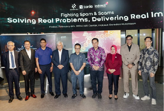 Business professionals comfortable with technology. Working on laptop.