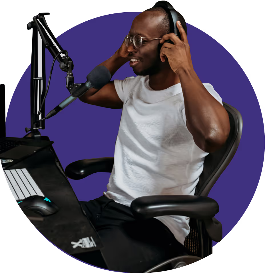 Picture of a man who is just putting on headphones to record an audio stream.