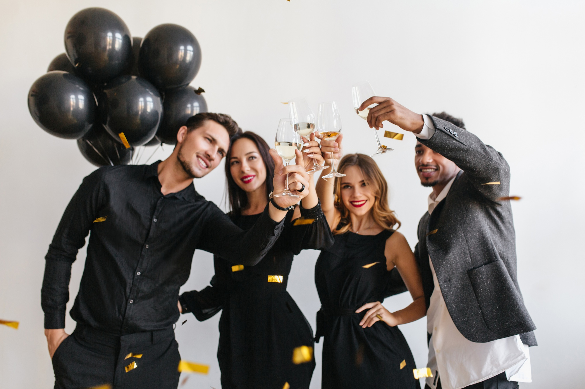 A team raises a toast to the company’s anniversary