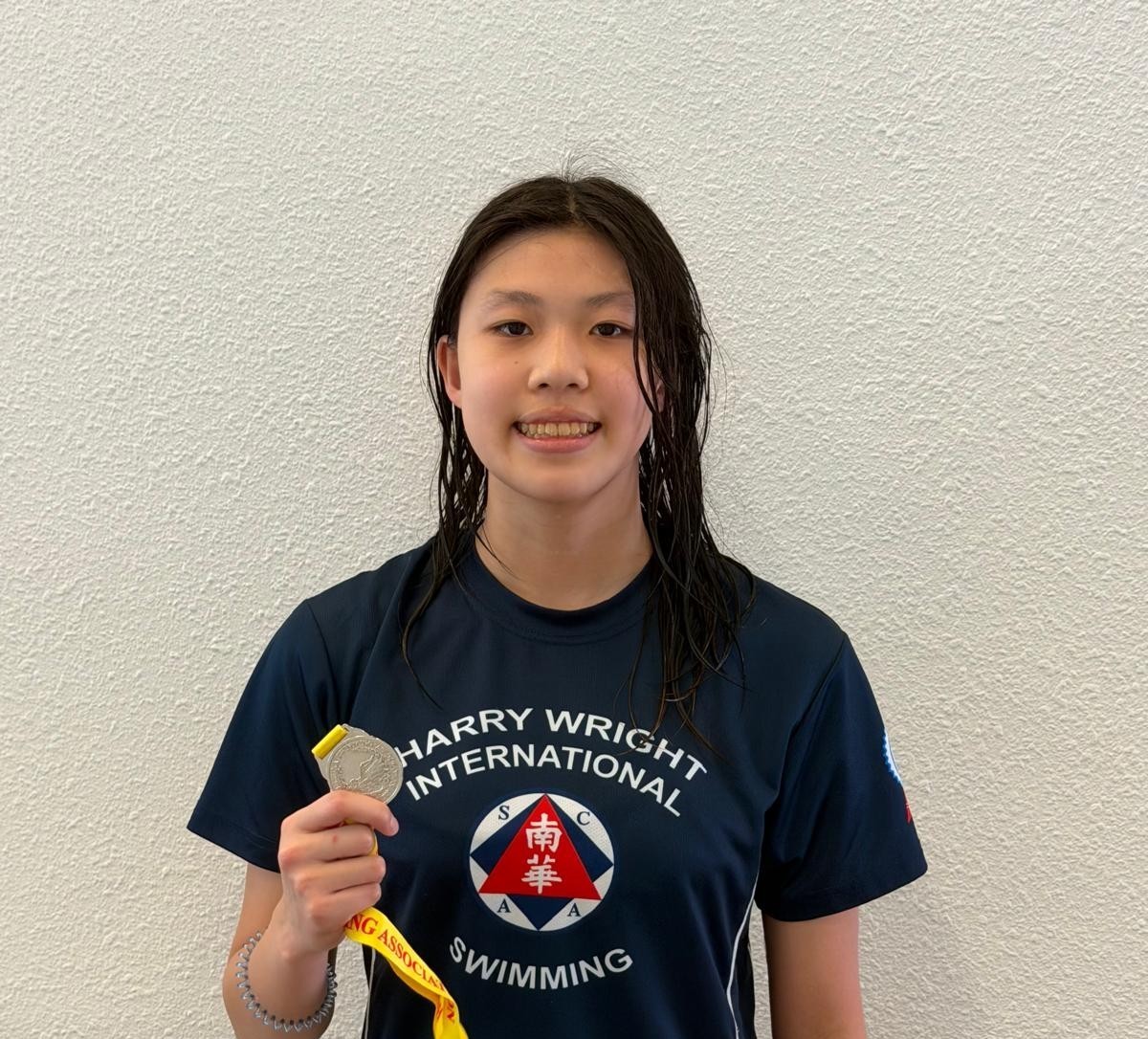 Yau Lok Kay takes silver in the 100m Backstroke at Division 2 Part 3 Long Course — Harry Wright Swim School Hong Kong