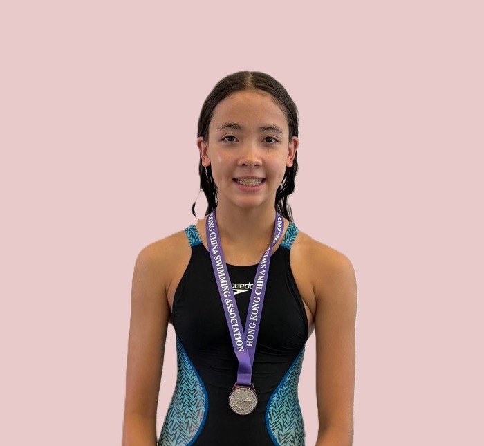 Harry Wright Swim School medallist wearing her medal at the Division 3 Part 3 Long Course Age Group Competition, Hong Kong