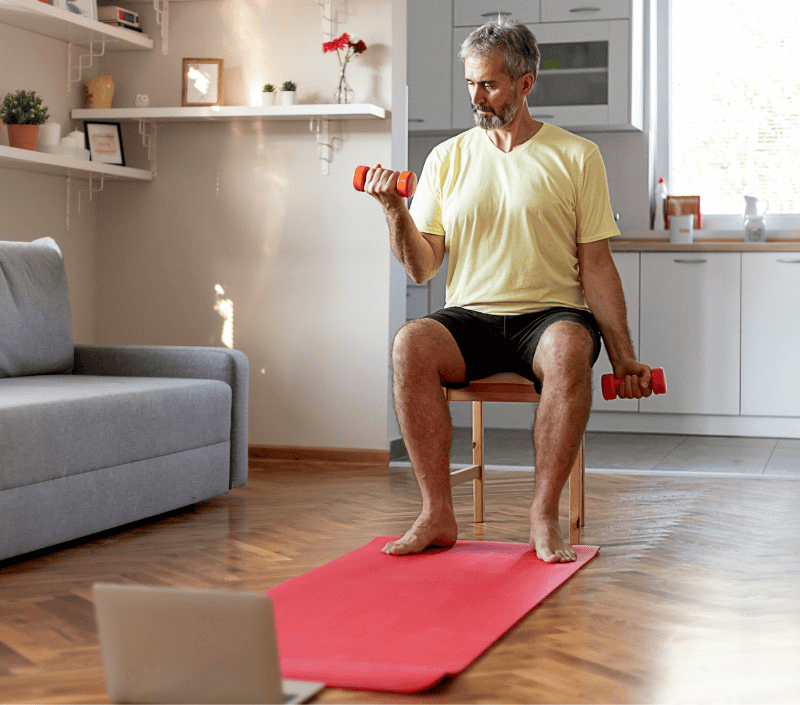 Vori Health logo overlaid on an image of a person exercising in their home