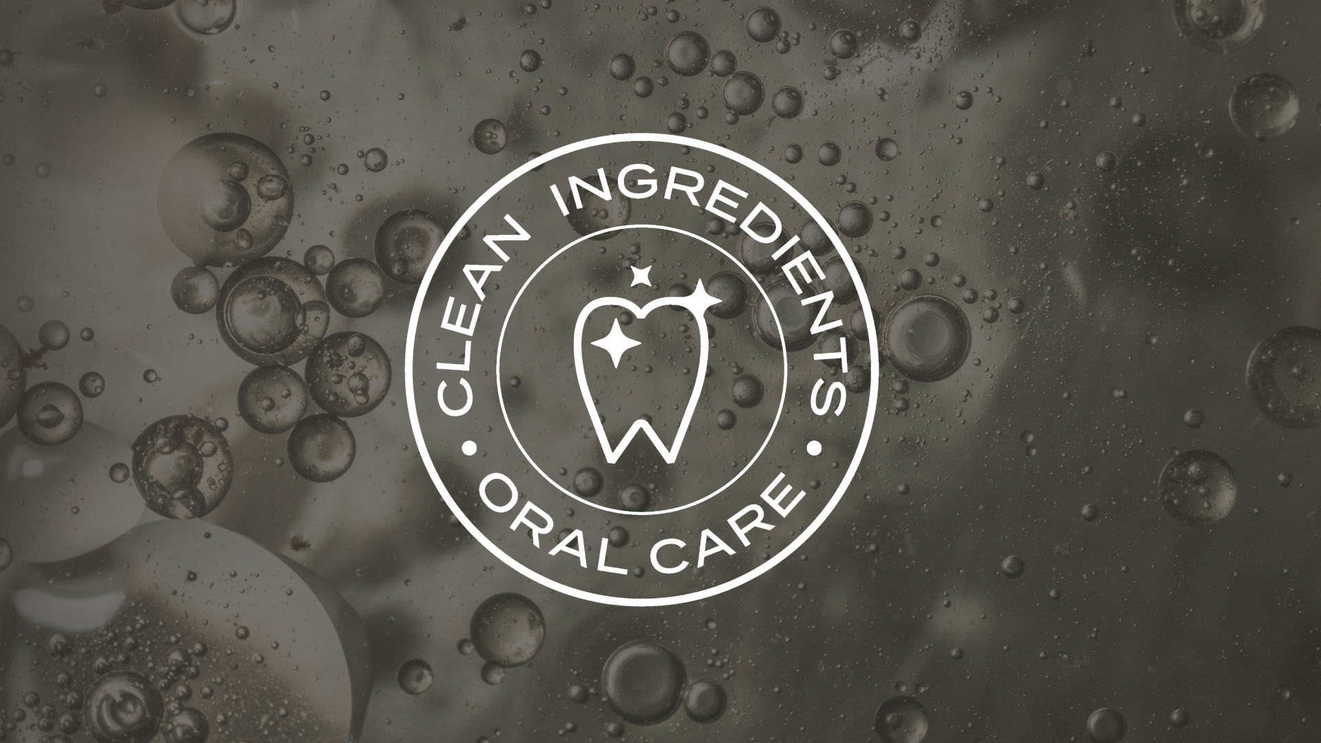 Seal with tooth and sparkle icon with the text Clean Ingredients Oral Care on a bubble background.