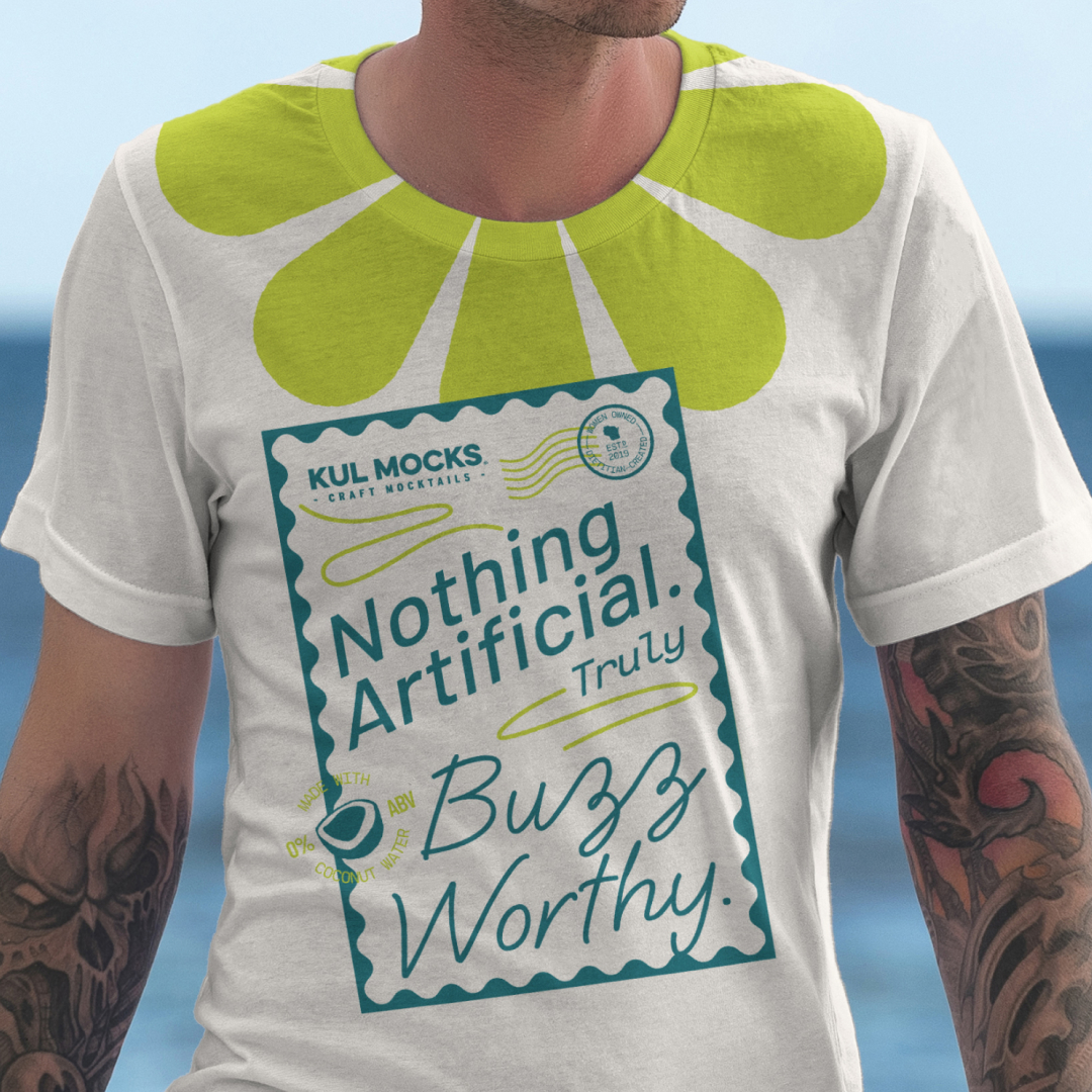 Man wearing white t-shirt with green petal-like design and text promoting natural mocktails.