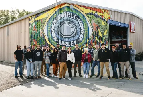 The entire Gnarly Barley Co. team in front the brewery and taproom