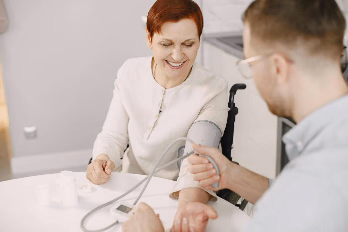 Nurse taking a patient's blood pressure