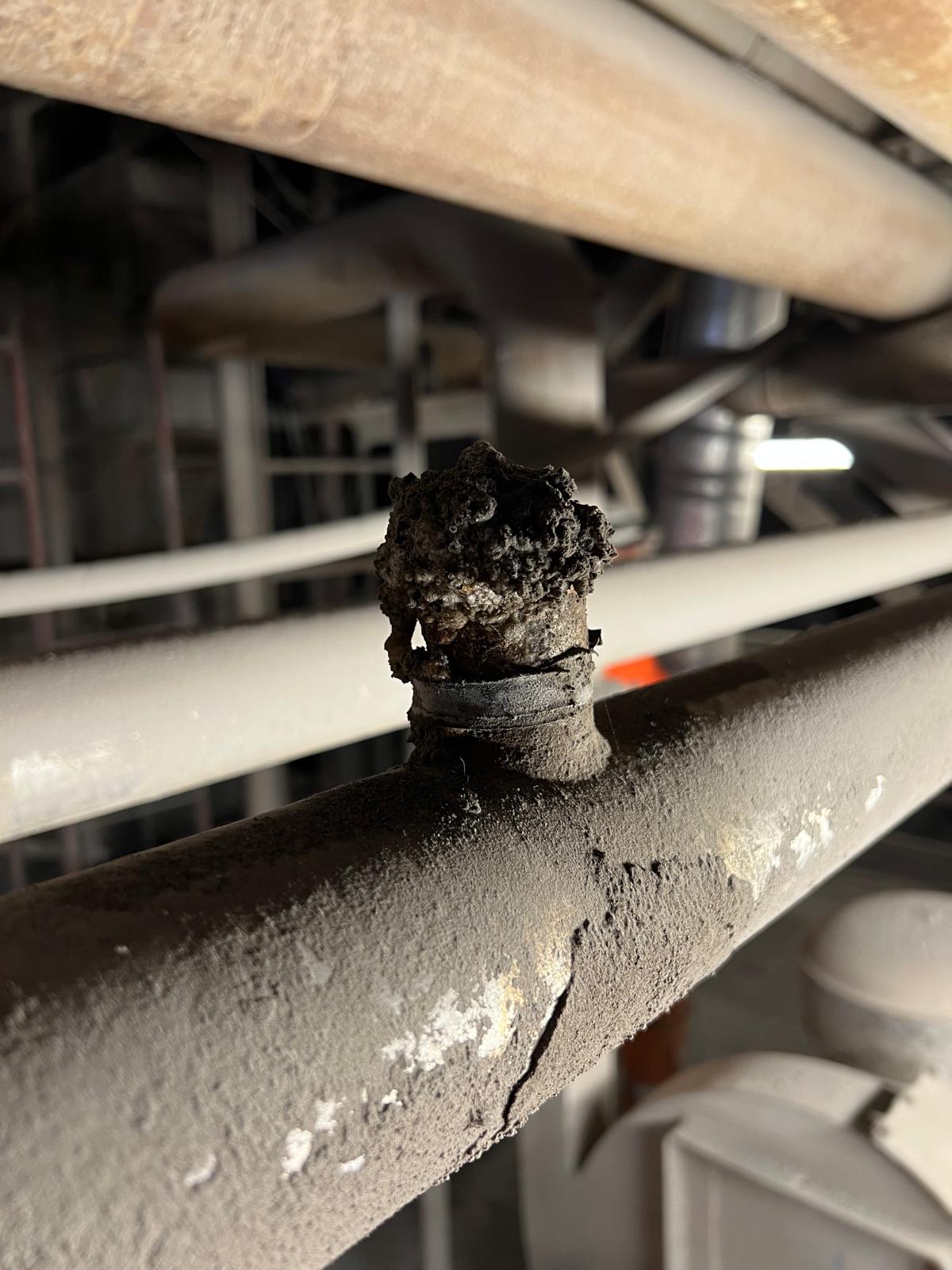 Corroded legacy plug and nozzle condition