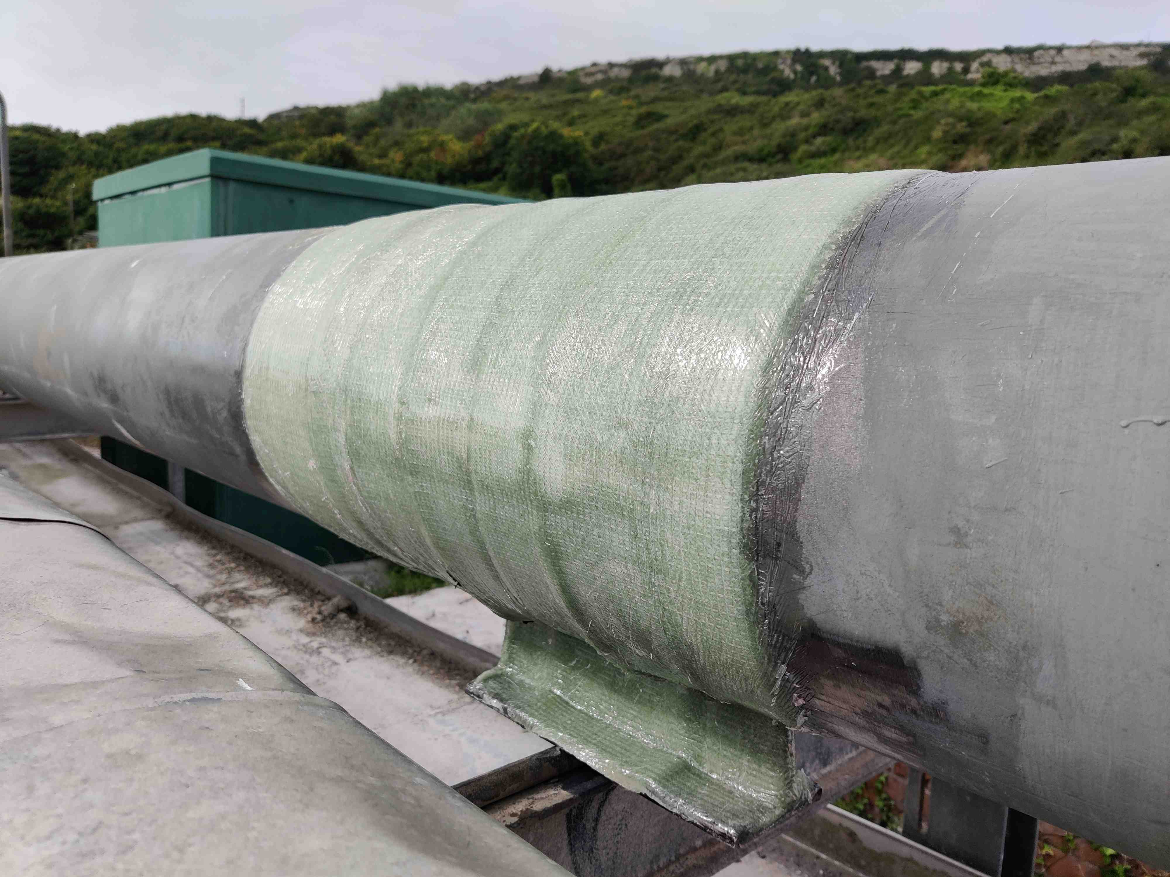 Completed BioWrap 102 repair around a 12-inch fuel-oil line support