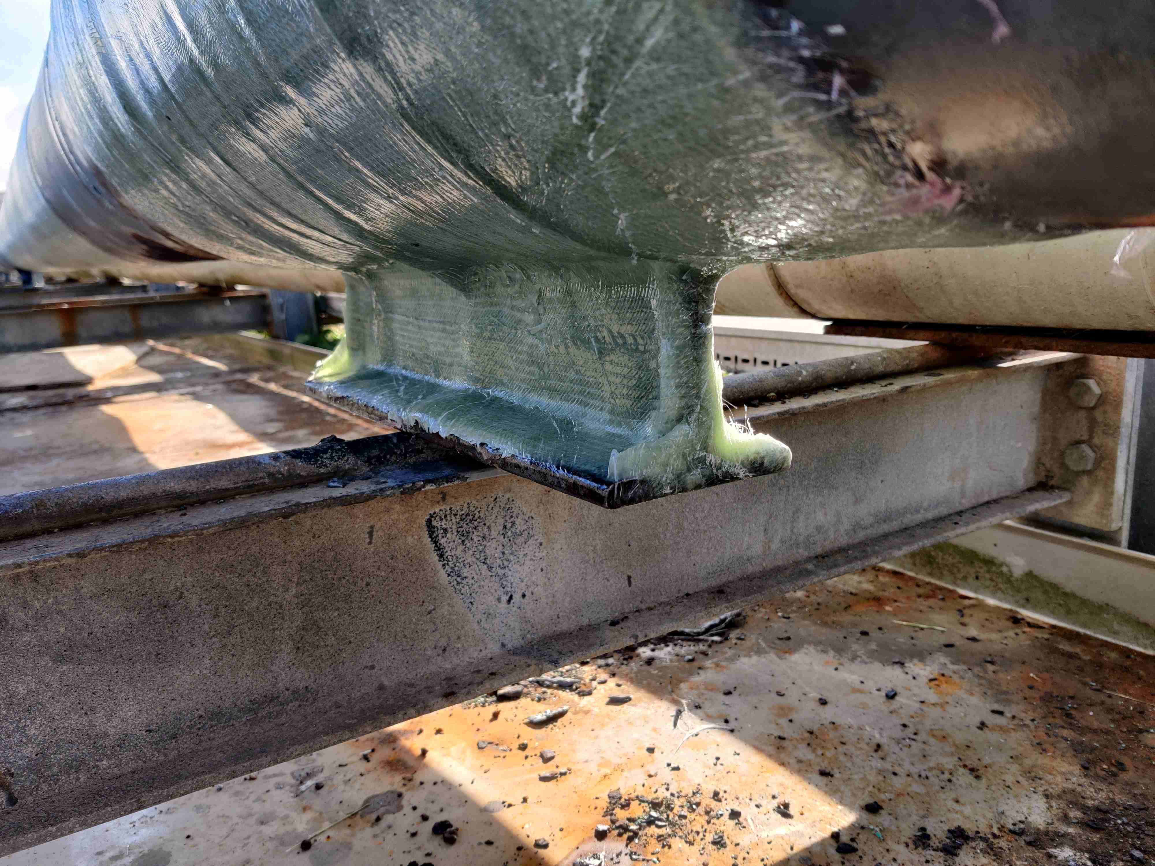 Completed engineered composite repair around a fuel-oil line support