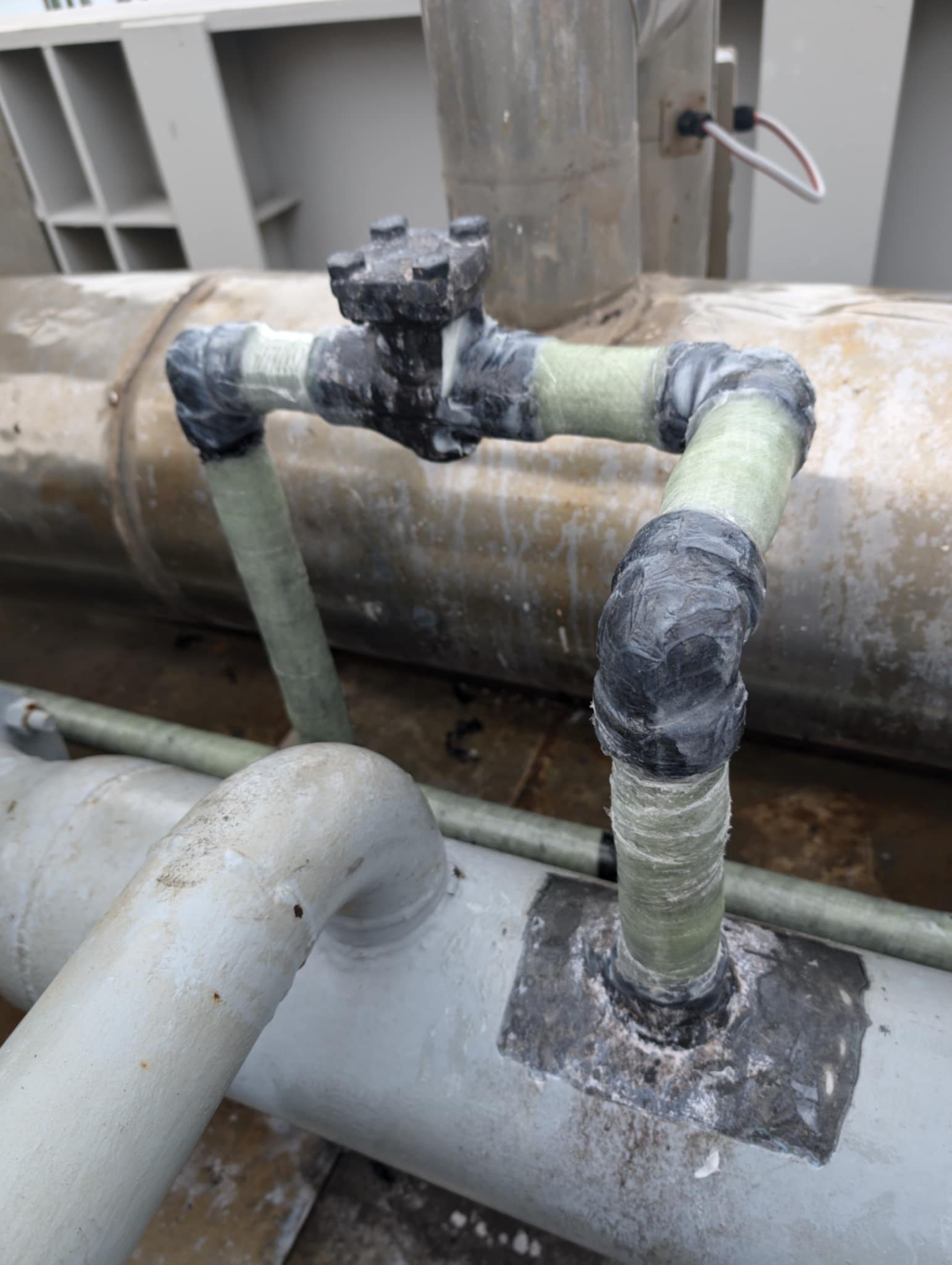 Completed four-layer BioWrap 102 reinforcement around MGO line elbows and branches