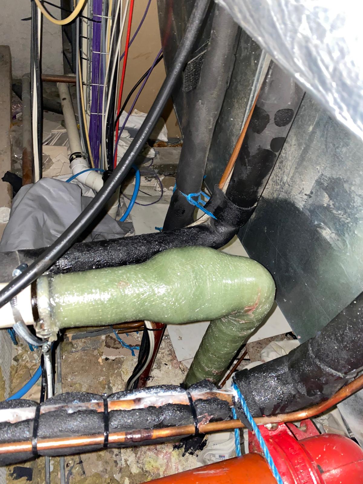 Completed BioWrap 102 overwrap around the elbow and temporary clamp