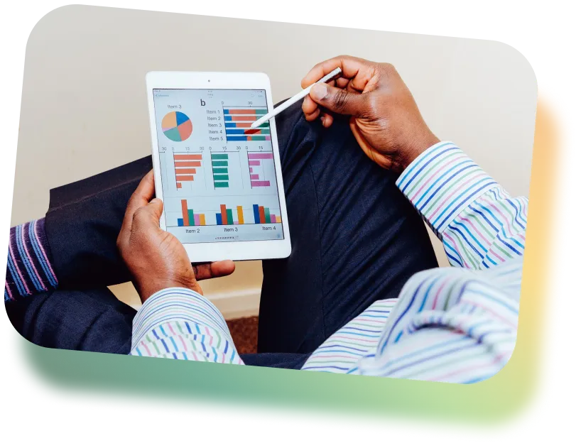 a person holding a tablet displaying charts and graphs of data