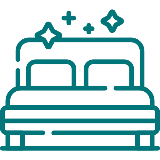 Icône de lit propre avec deux oreillers et des étoiles scintillantes au-dessus.