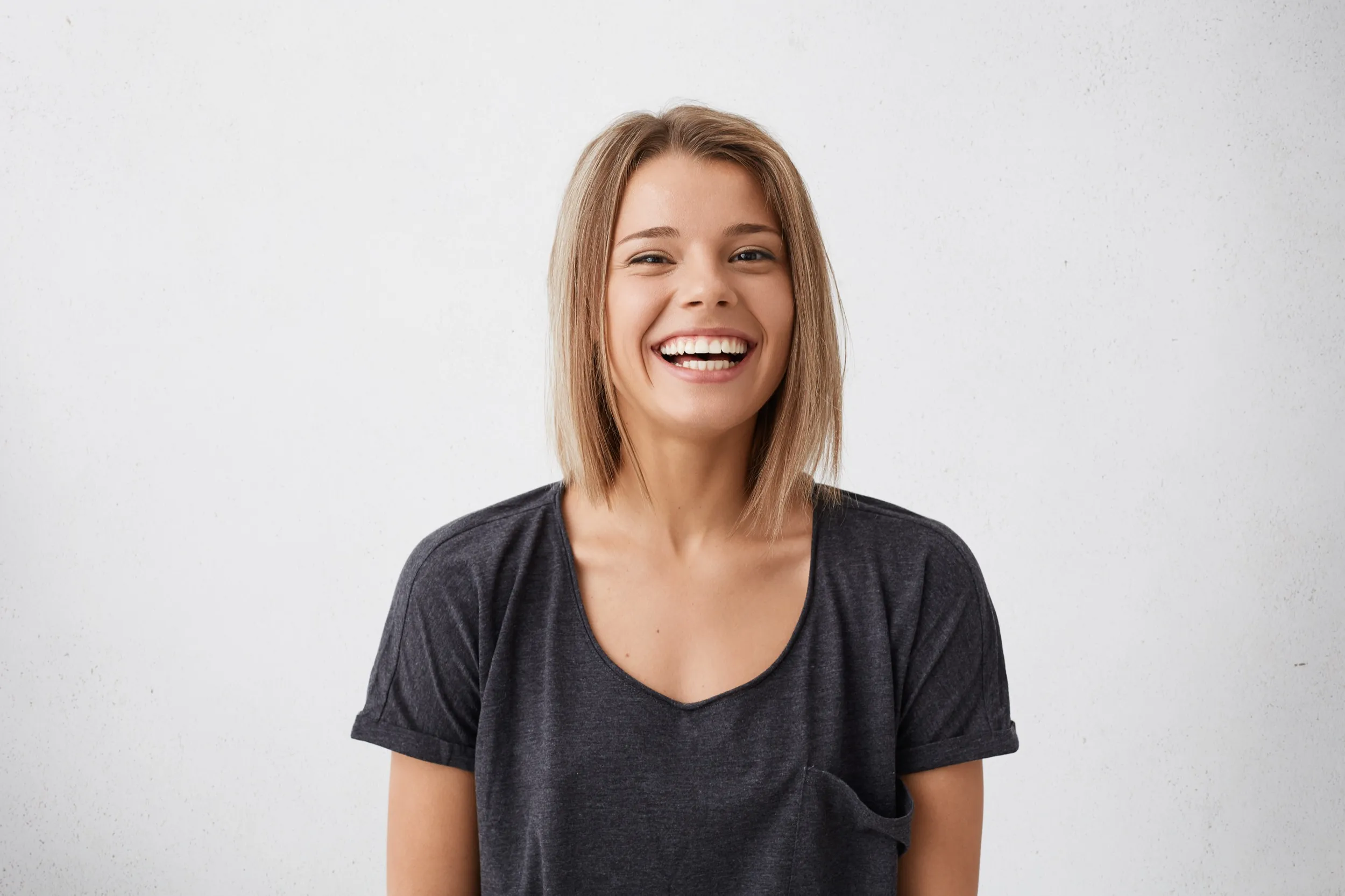 A woman with a smile on her face