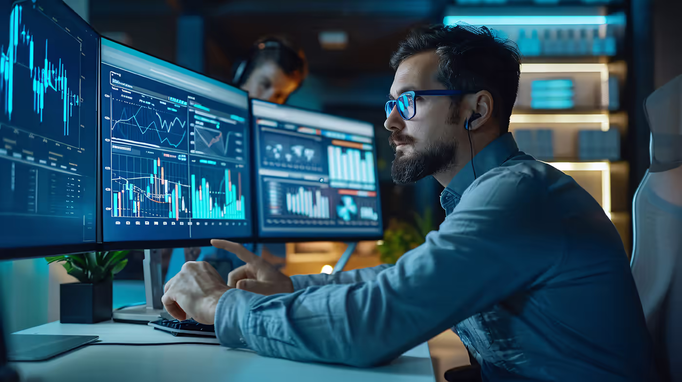 A logistics manager reviewing a digital dashboard comparing asset-based, brokerage, and hybrid carrier options.