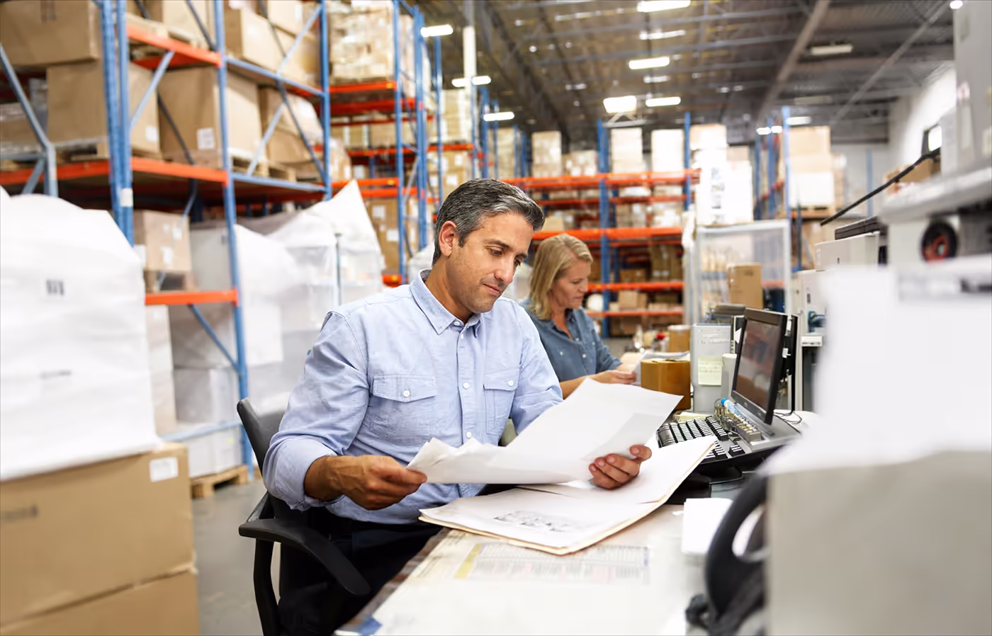 Transportation management team reviewing freight costs during a period of decreased demand