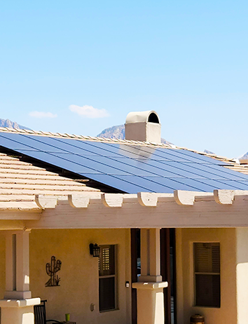 Solar panels on a tile-roof home in Tucson