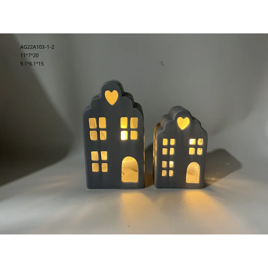 Dark gray ceramic house-shaped candle holders.