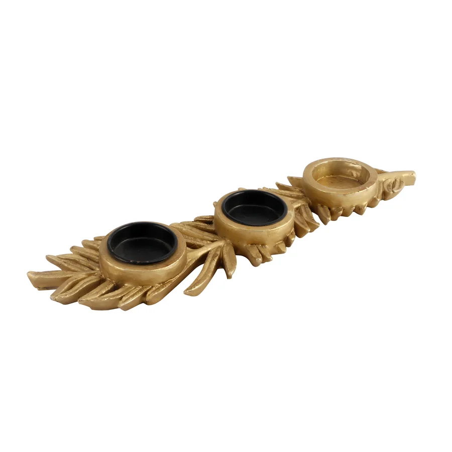 Gold leaf-shaped candle holder with three cups.