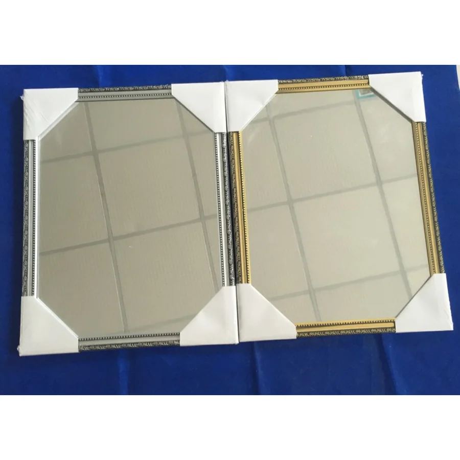 Silver and gold ornate frame wall mirrors.