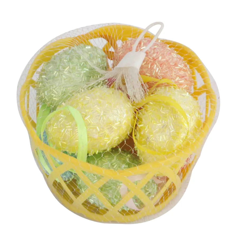Colorful beaded egg-shaped ornaments in a basket.