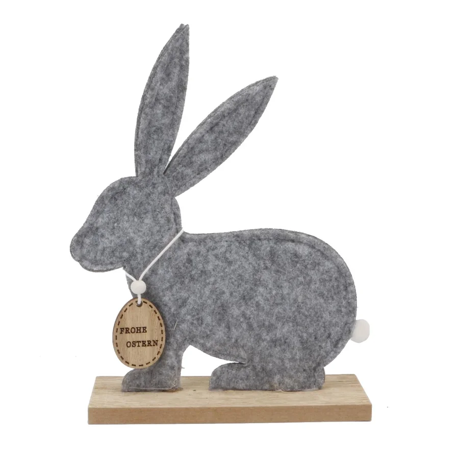 Gray felt rabbit decoration on wooden base.