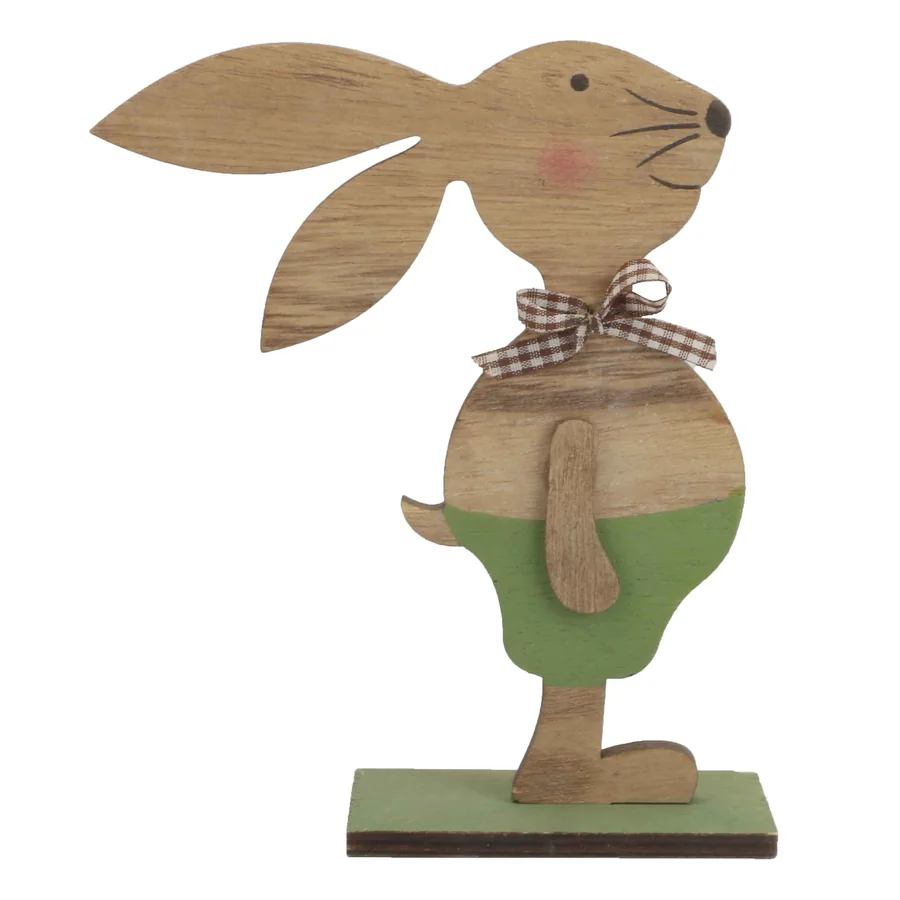 Wooden rabbit figurine with green pants.