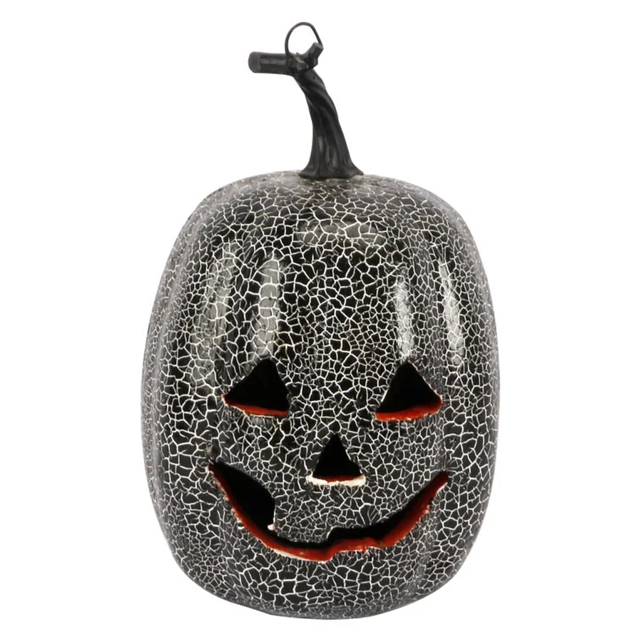 Black cracked pumpkin Halloween decoration.