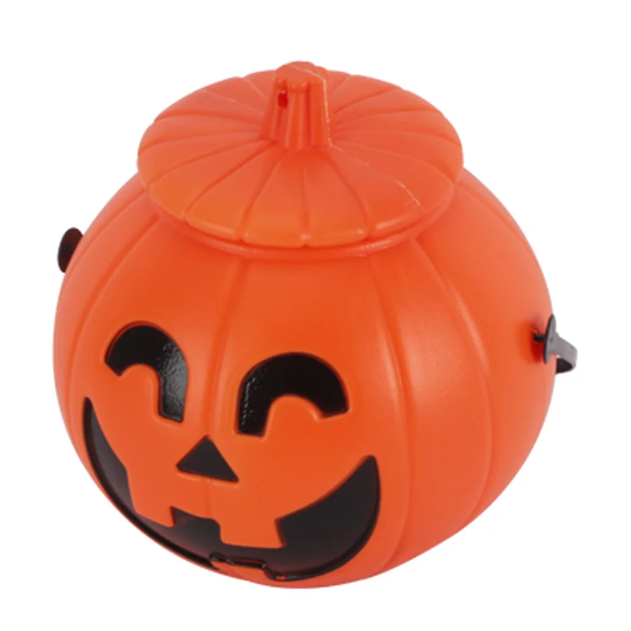 Orange plastic pumpkin candy bucket.