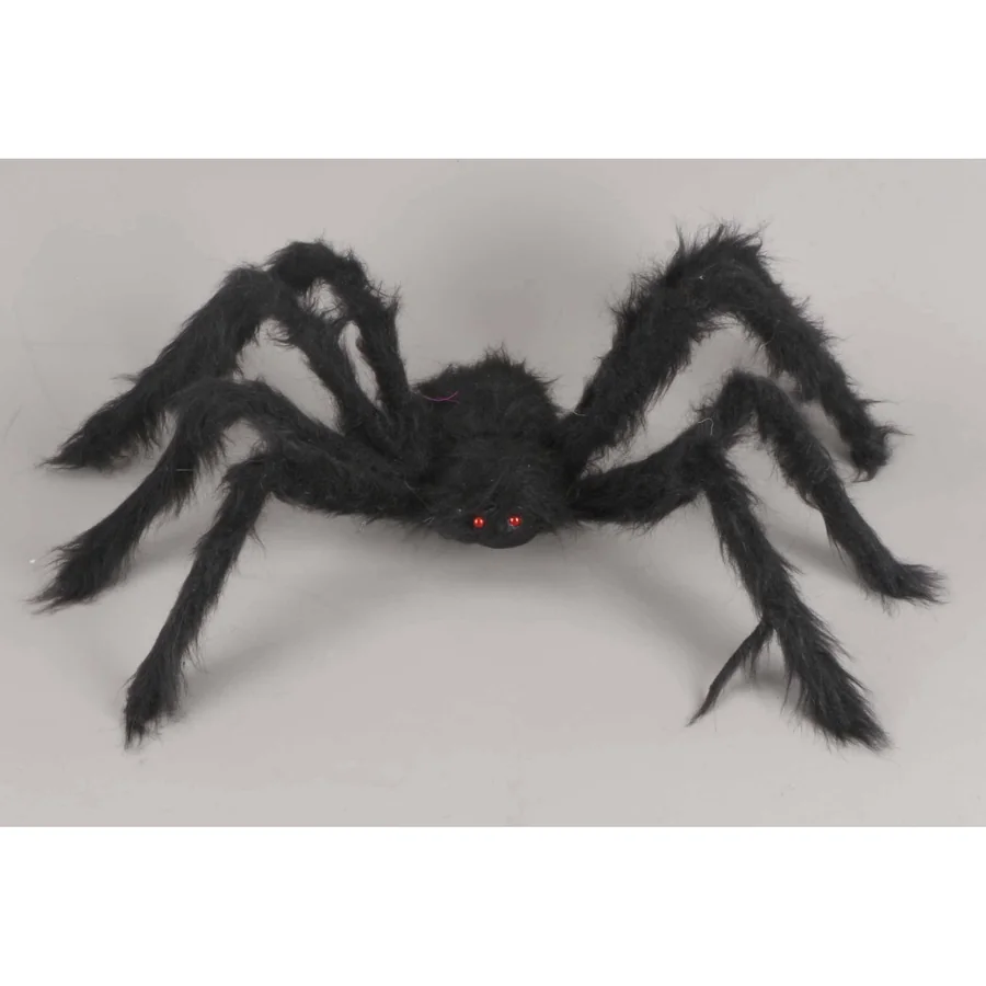 Furry black spider decoration with red eyes.