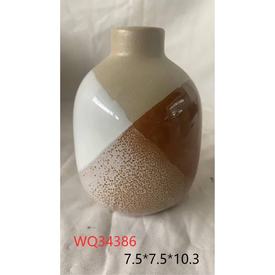 Ceramic vase with tri-color design.