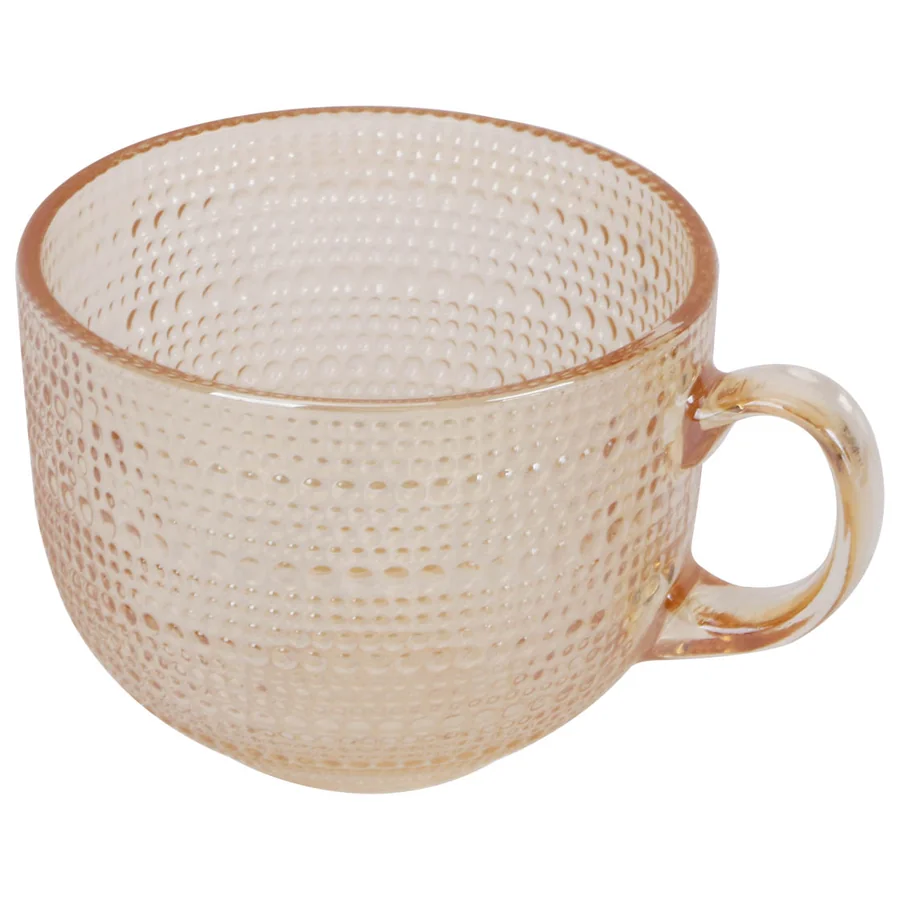 Pink textured glass mug with handle.