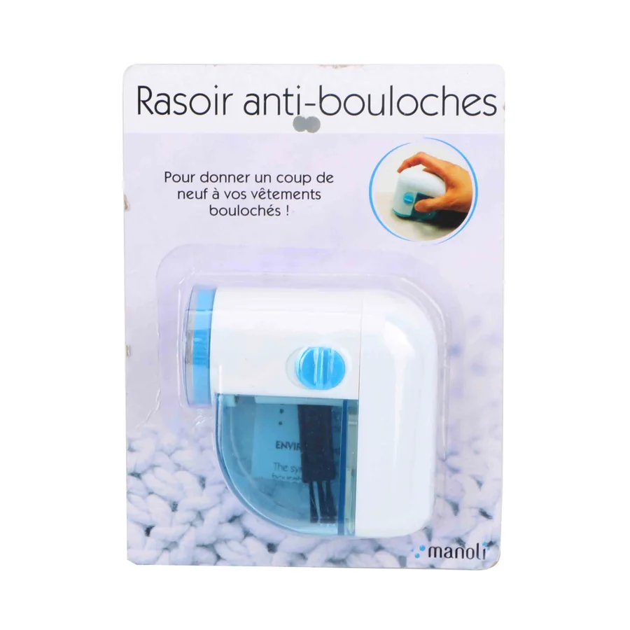 White and blue fabric lint remover in its packaging.