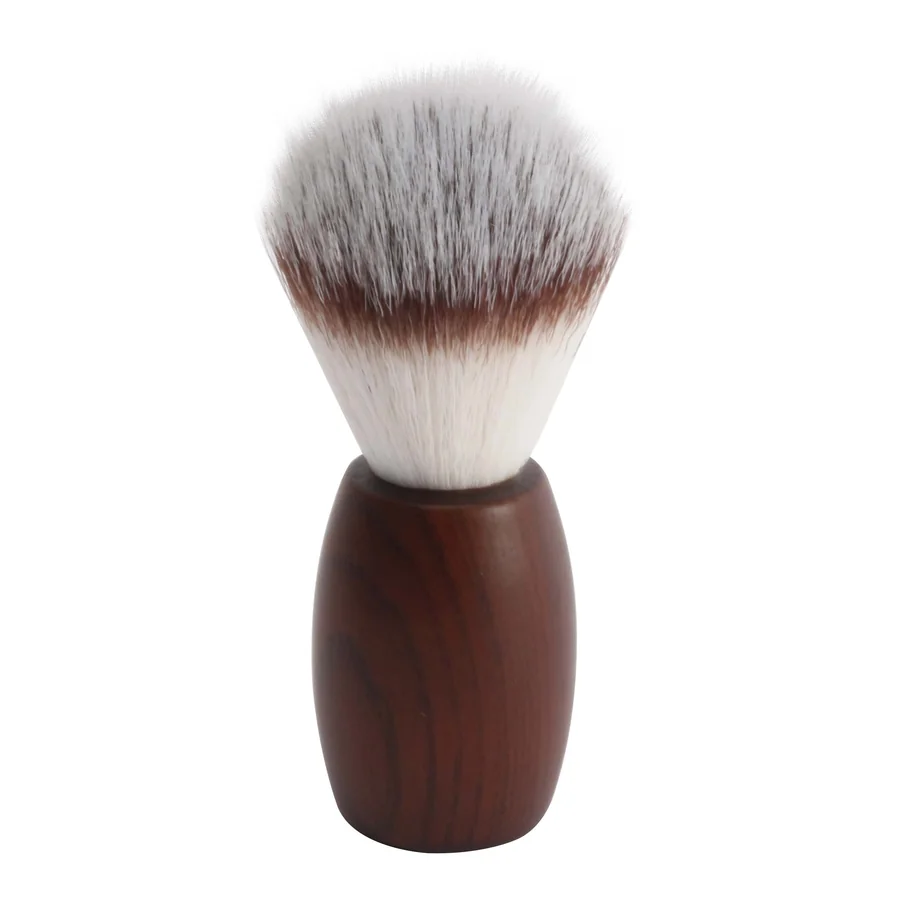 Shaving brush with a wooden handle and white bristles.