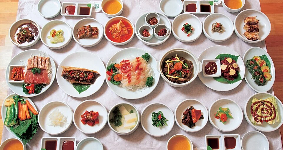 Various Korean dishes set on a table. Credit: Wikimedia