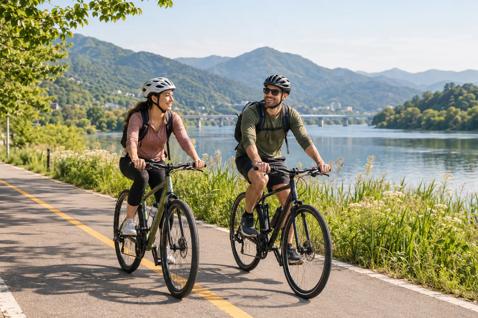 AI-generated illustration of fictional helmeted cyclists beside a Korean river; not a photograph of the TAGY tour