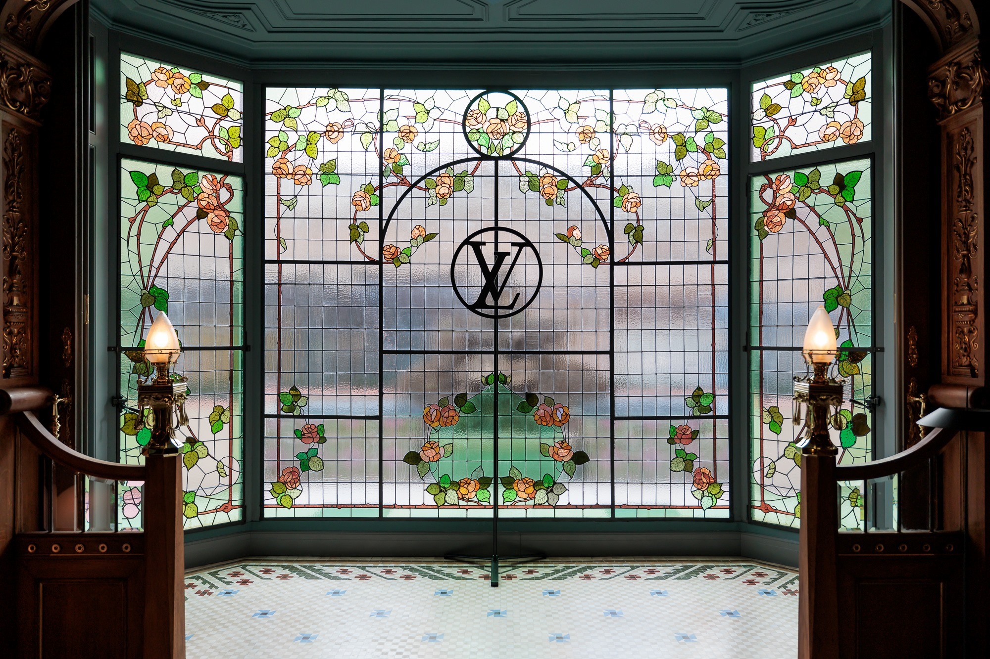 Modernist stained glass window with Louis Vuitton monogram, Cruise 2025 Resee event space produced by ESMA Events in Barcelona