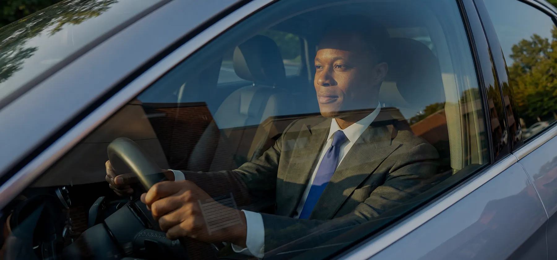 A man driving his car