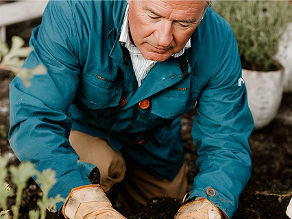 Landscaper tending to garden