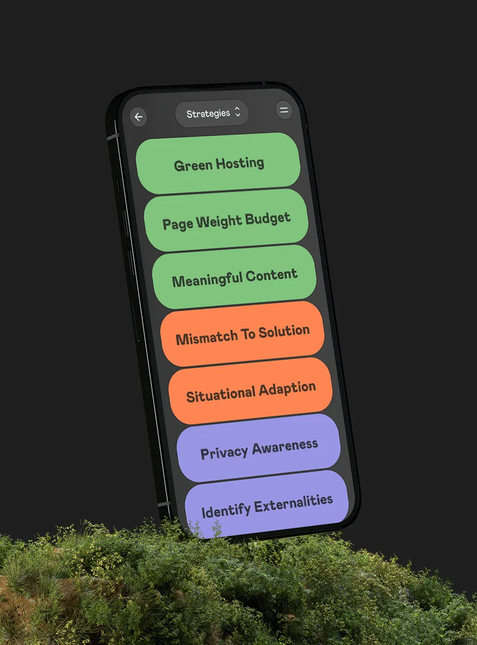 iPhone standing on a green overgrown surface. The screen shows various strategies for the sustainable design and development of digital products and services in the colors green, orange and purple-blue.