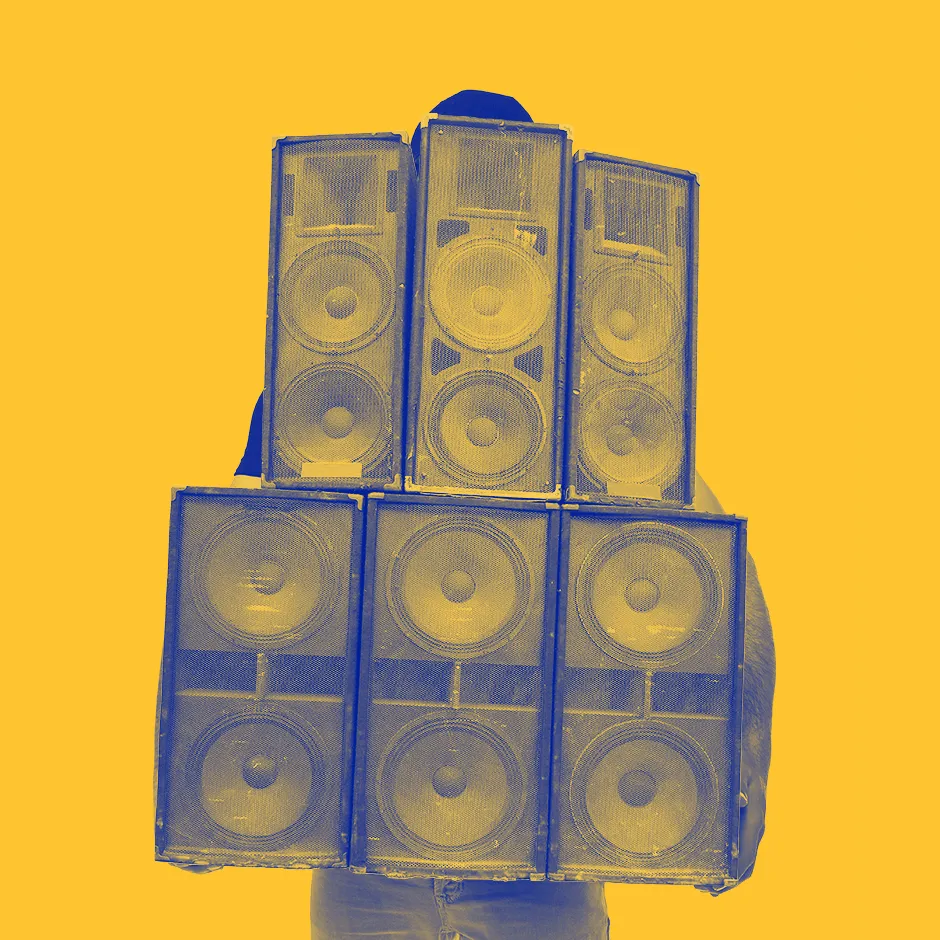Photo collage with a dark blue gradient translation on a yellow surface. The motif shows the upper body of a man, which is almost completely obscured by huge loudspeaker boxes that he is carrying in his arms. 