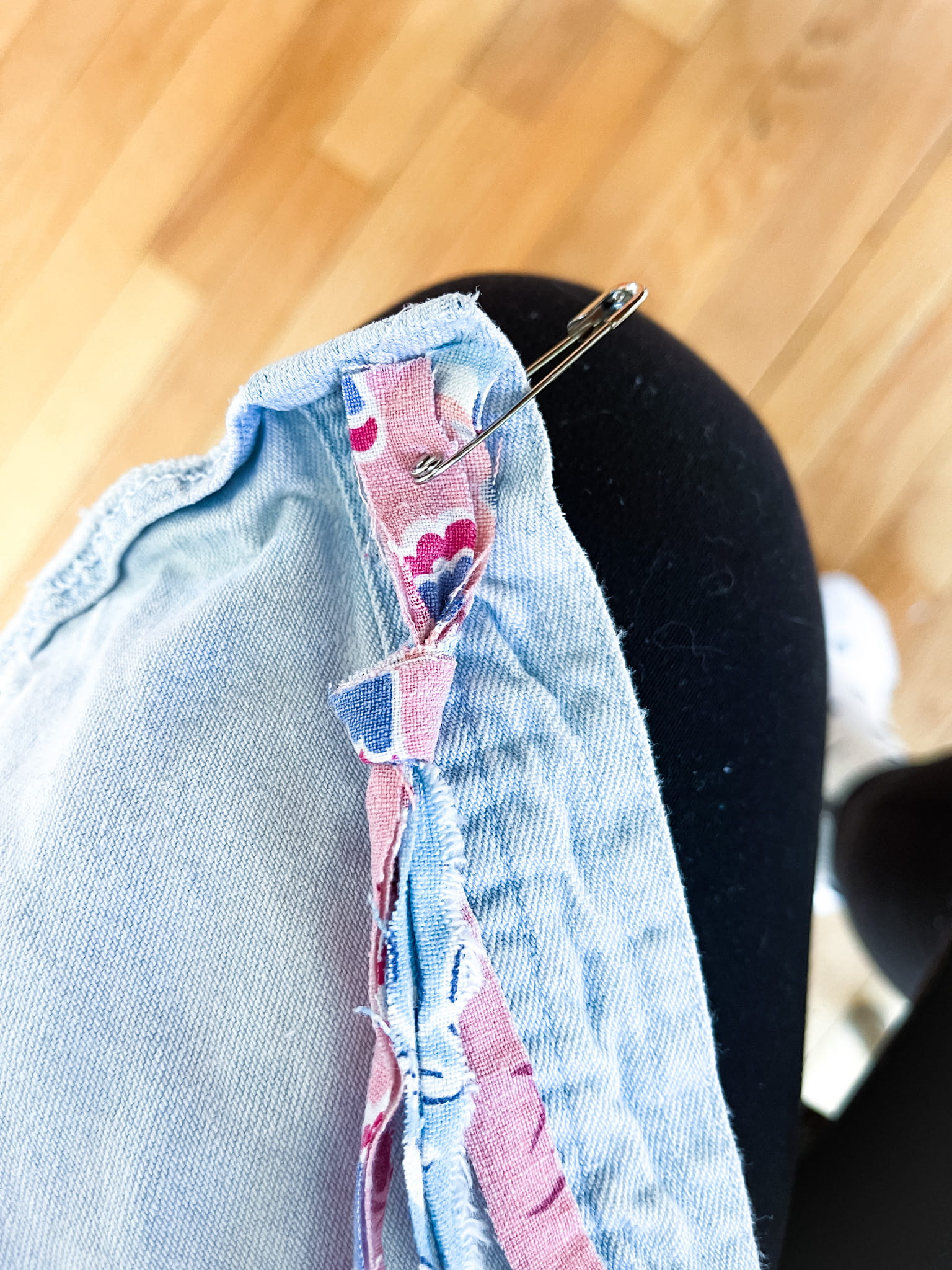 strips of vintage fabric pinned onto the end of the